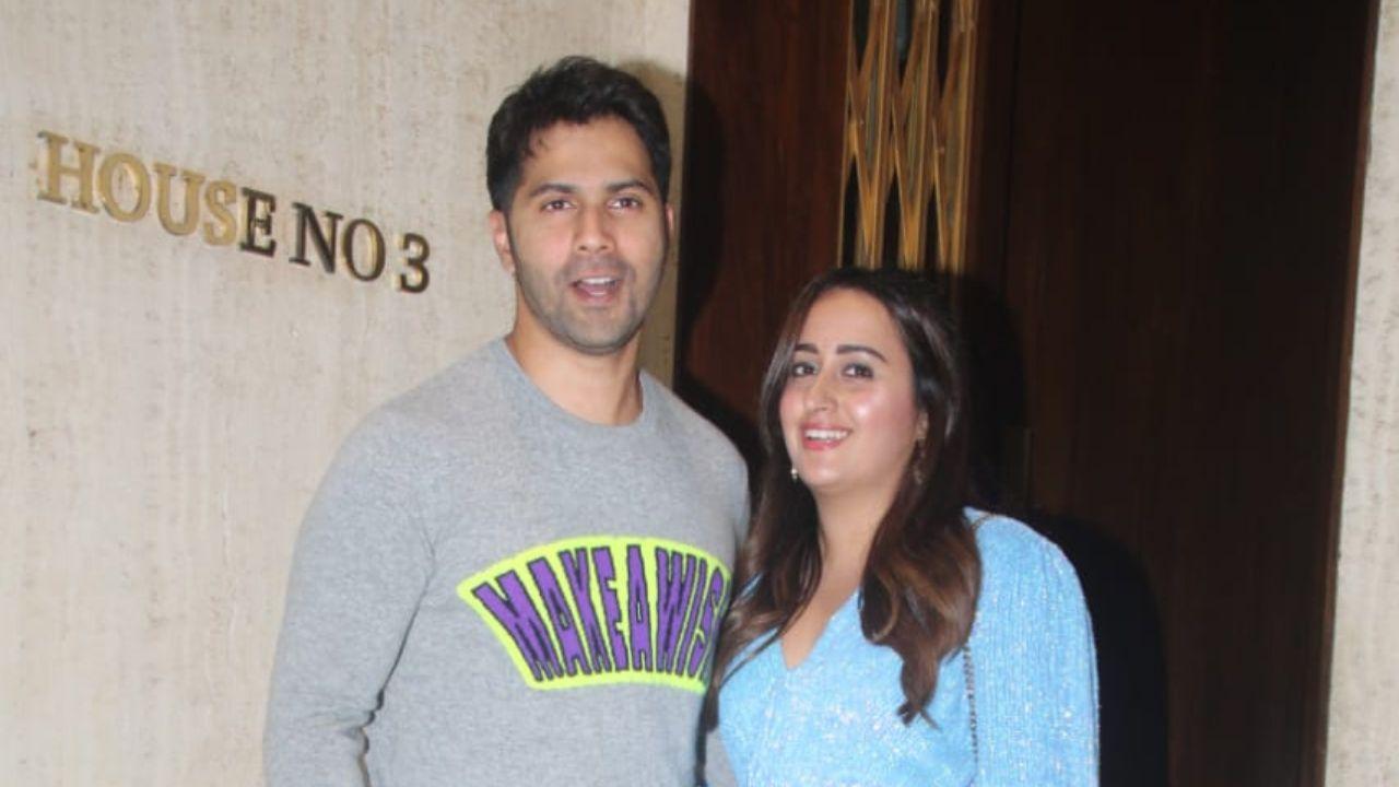 Varun Dhawan chose to wear a simple sweatshirt, while his wife Natasha looked pretty in her light blue costume. 